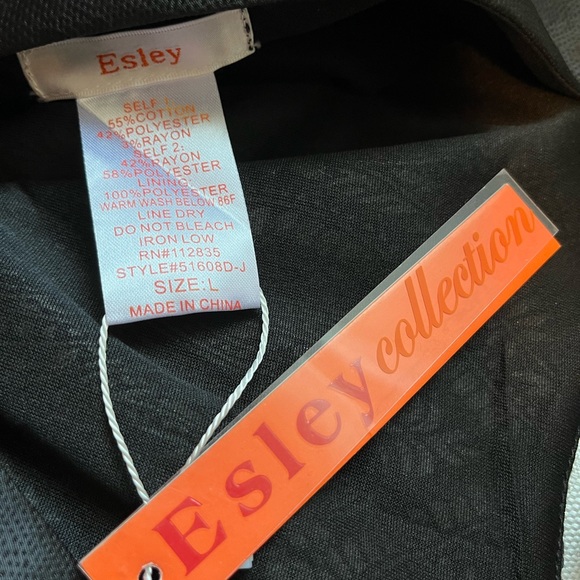 Fitted black and silver dress with beaded shoulder treatment. - Picture 4 of 4